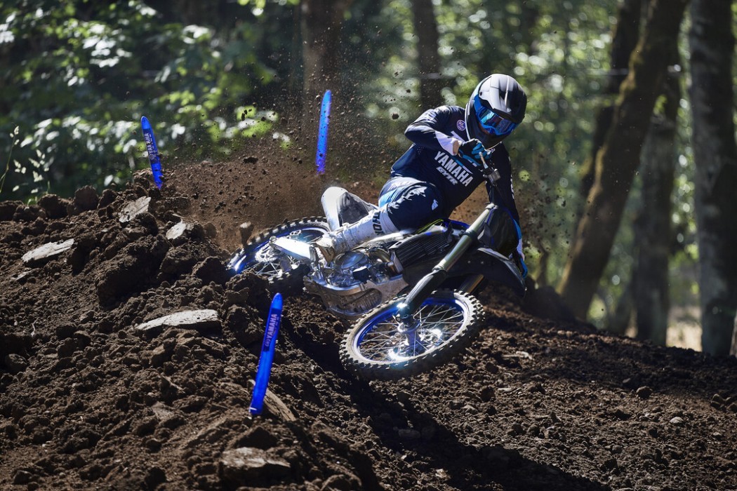 YZ450FSP 2025 static image of motocross bike racing around corner