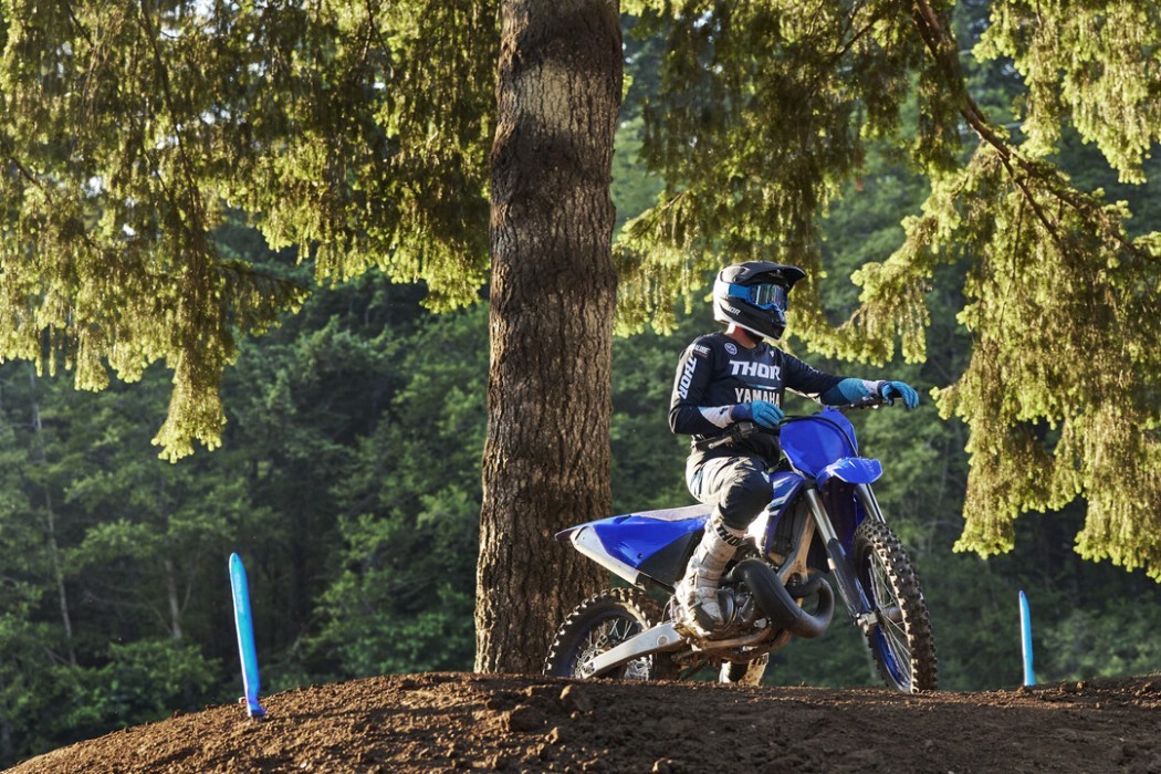 YZ250 2025 static image of motocross bike racing with rider stopped on track