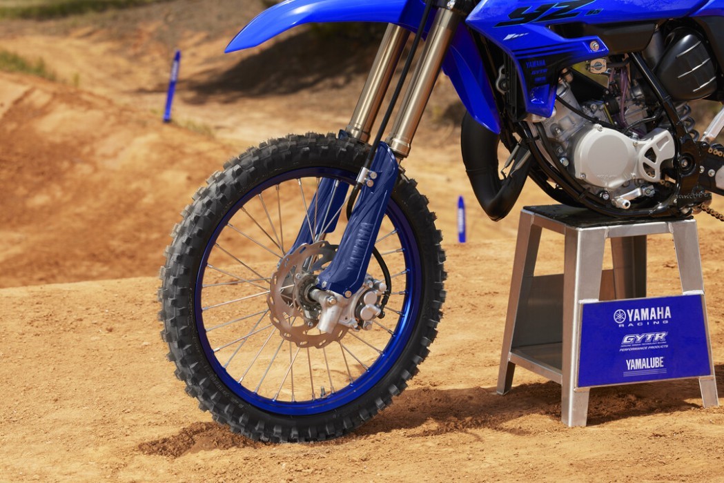 Detail image of Yamaha YZ85 two stroke in Blue colourway, front wheel, guard and suspension lowers