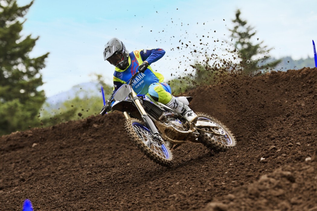 YZ450FSP 2025 static image of motocross bike racing around corner