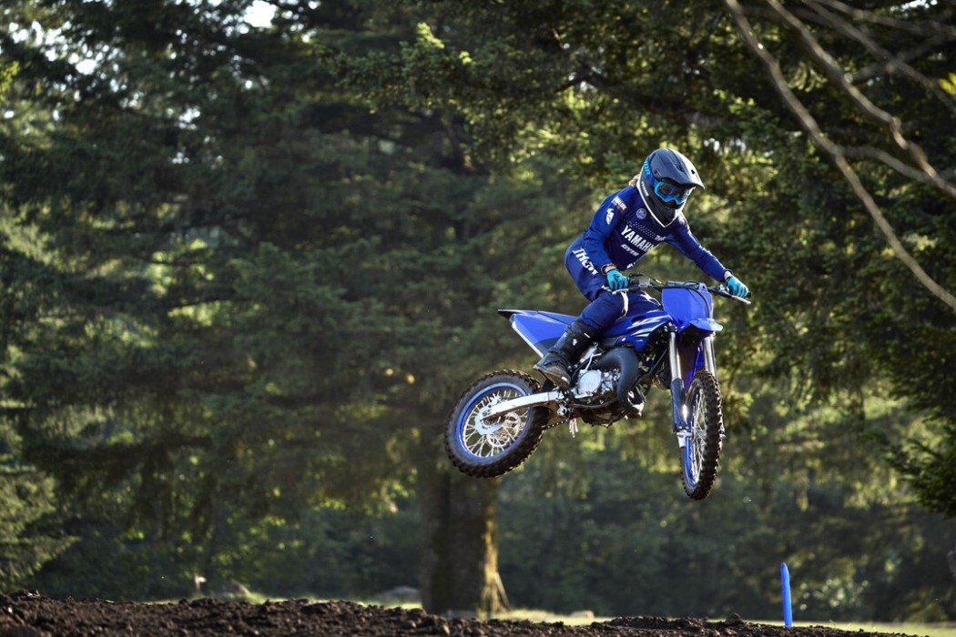 YZ85 2025 static image of motocross bike doing jump