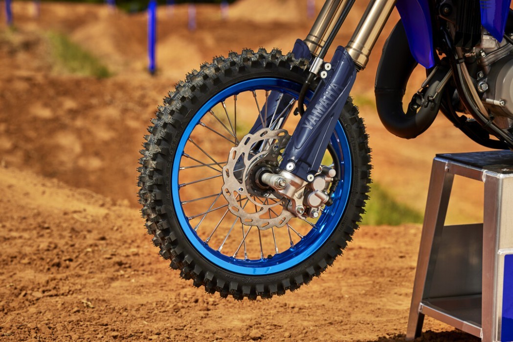 Detail image of Yamaha YZ65 two stroke in Blue colourway, front wheel, guard and suspension lowers