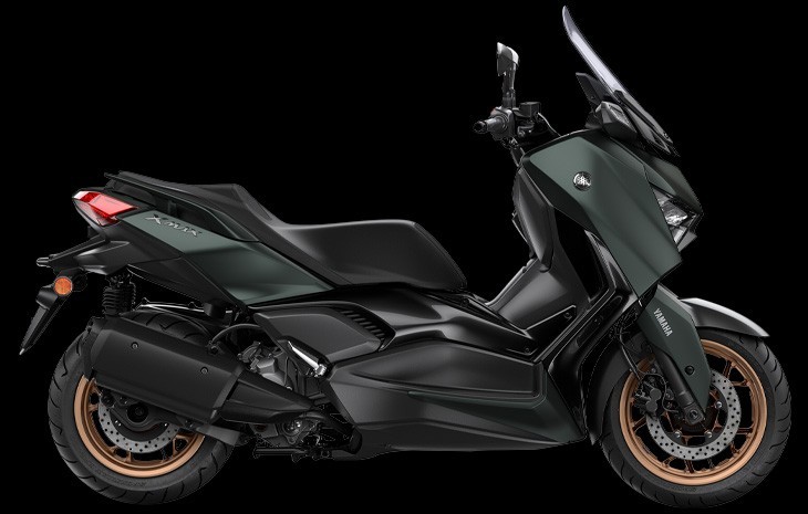 Studio image of Yamaha XMAX 300 scooter in petrol green colourway, available at Brisan Motorsports Islington