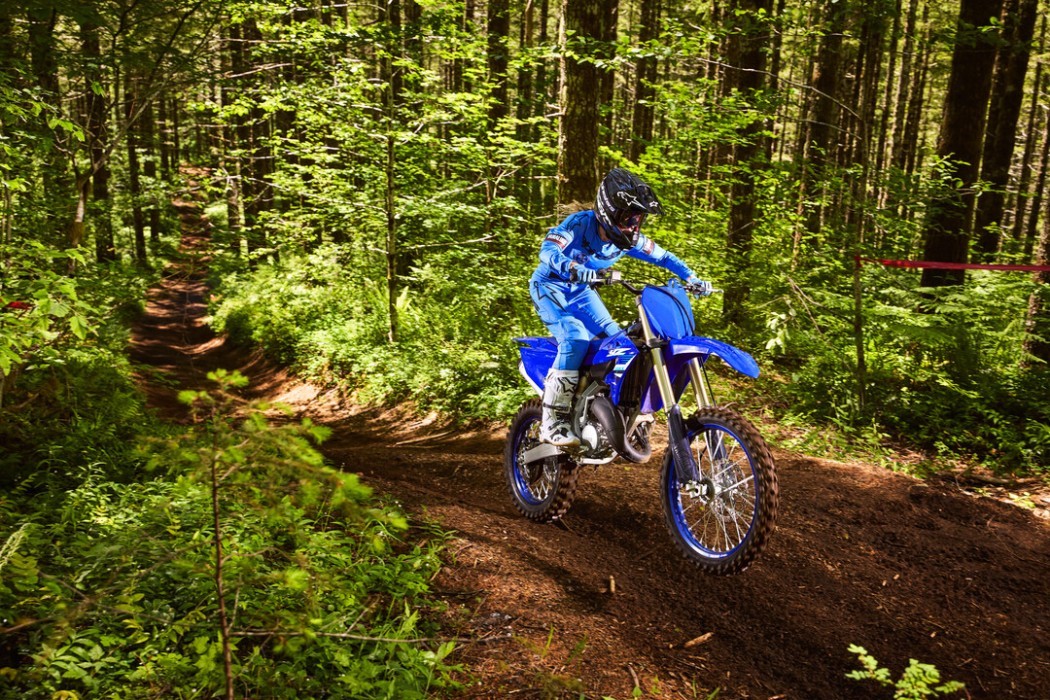 YZ125X 2025 static image of enduro bike doing a jump