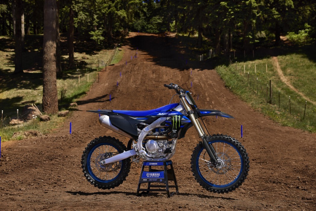 YZ450FSP 2025 static image of motocross bike on stand on track