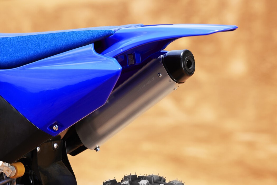 Detail image of Yamaha YZ85 two stroke in Blue colourway, exhaust and rear guard