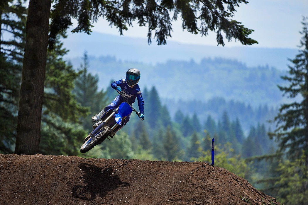 Action image of Yamaha YZ250F 2024 Motocrosser in Blue Colourway, small jump