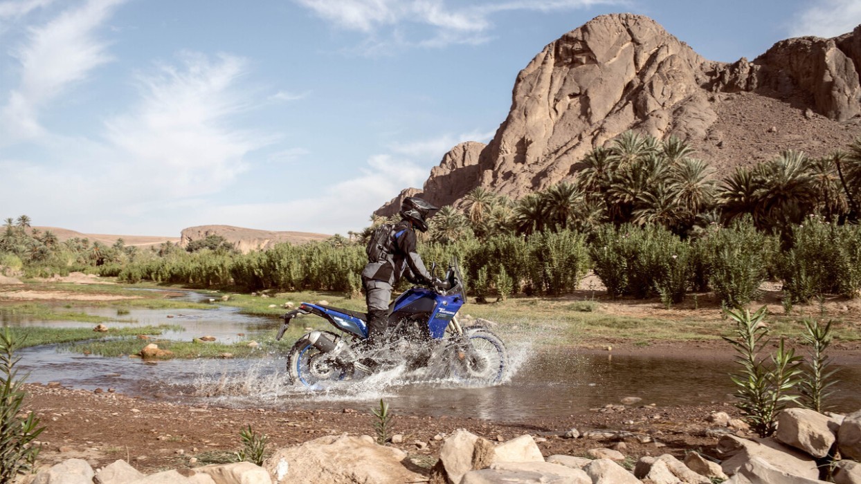 Action image of Yamaha Tenere 700 in Blue Colourway, side on river crossing