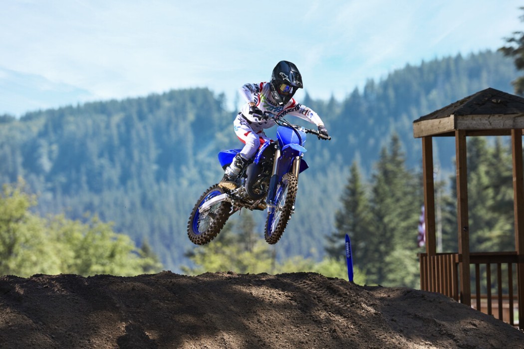 YZ85LW 2025 static image of motocross bike doing jump