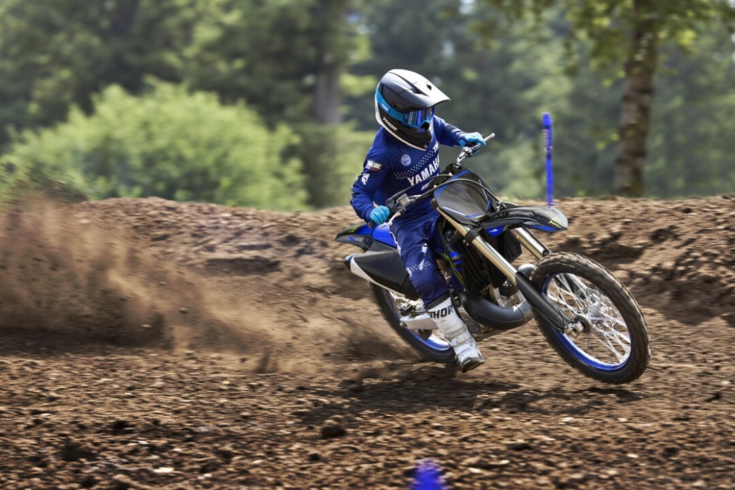 YZ250SP 2025 static image of motocross bike racing around corner