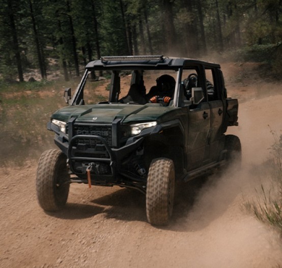 Outdoor action image of Polaris Xpedition XP 5 Ultimate driving on trail