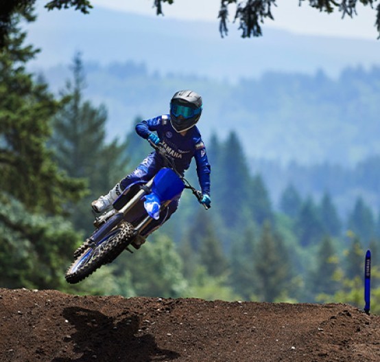 Action image of Yamaha YZ250F 2024 Motocrosser in Blue Colourway, small jump