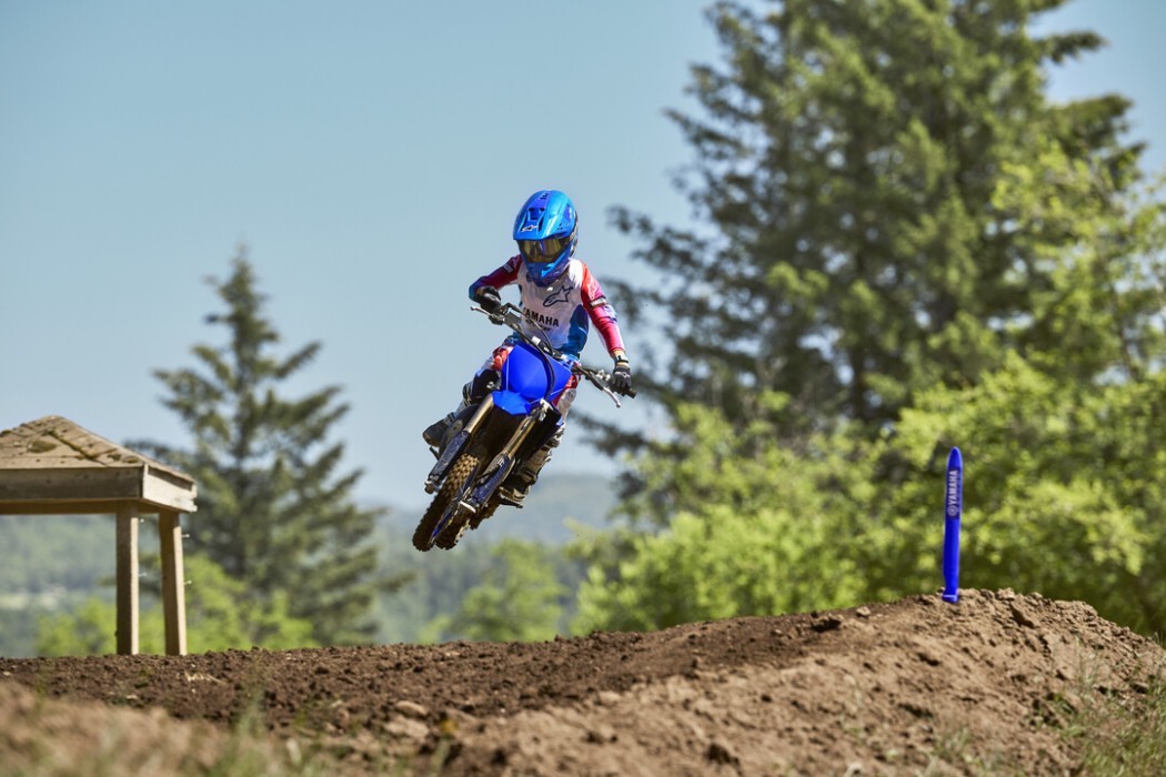 YZ65 2025 static image of motocross bike doing jump