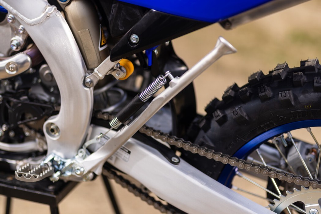 Detail image of Yamaha WR250F 2024 in blue colourway, retracted sidestand