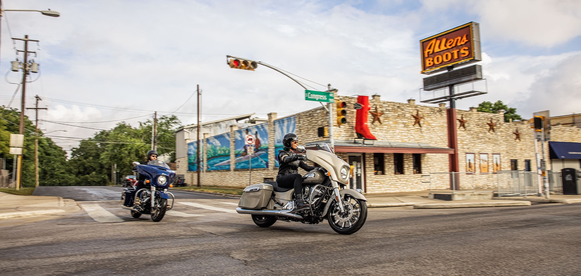 Action Image of two Indian Chieftain Limited motorcycles entering an intersection