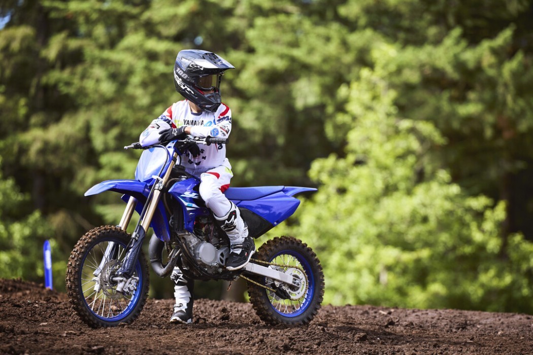 YZ85 2025 static image of motocross bike with rider still on track