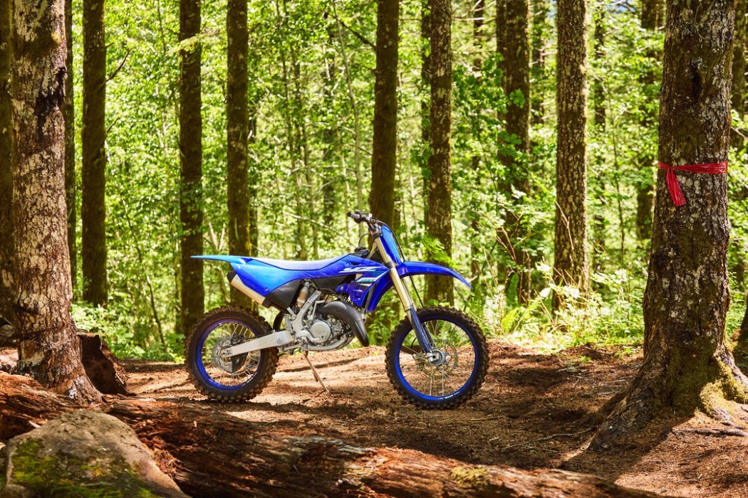 YZ125X 2025 static image of enduro bike standing on track