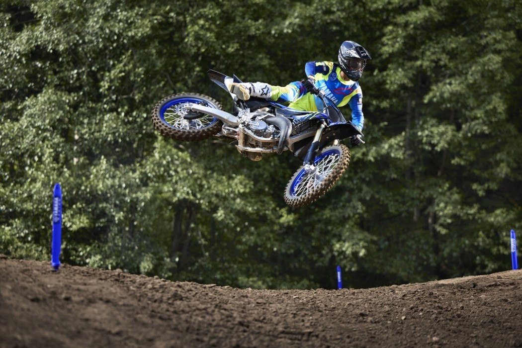 YZ125SP 2025 static image of motocross bike doing whip over jump