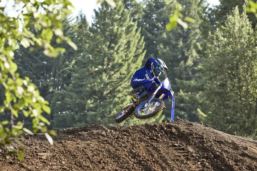 action image of Yamaha YZ85 two stroke in Blue colourway, small jump