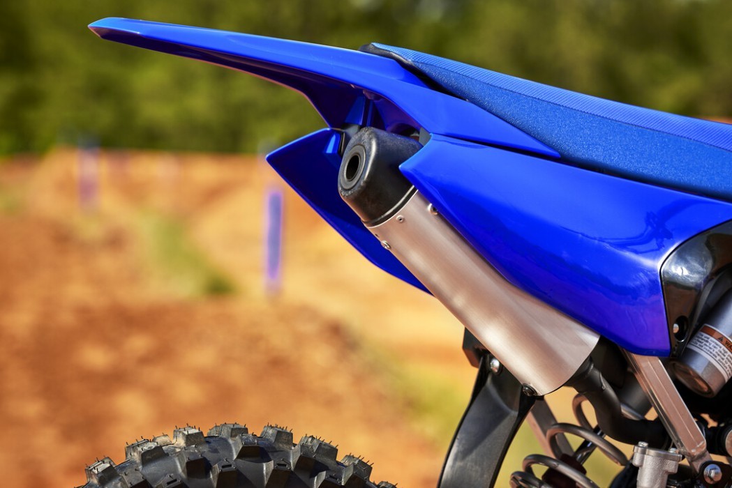 Detail image of Yamaha YZ85 two stroke in Blue colourway, exhaust and rear mudguard
