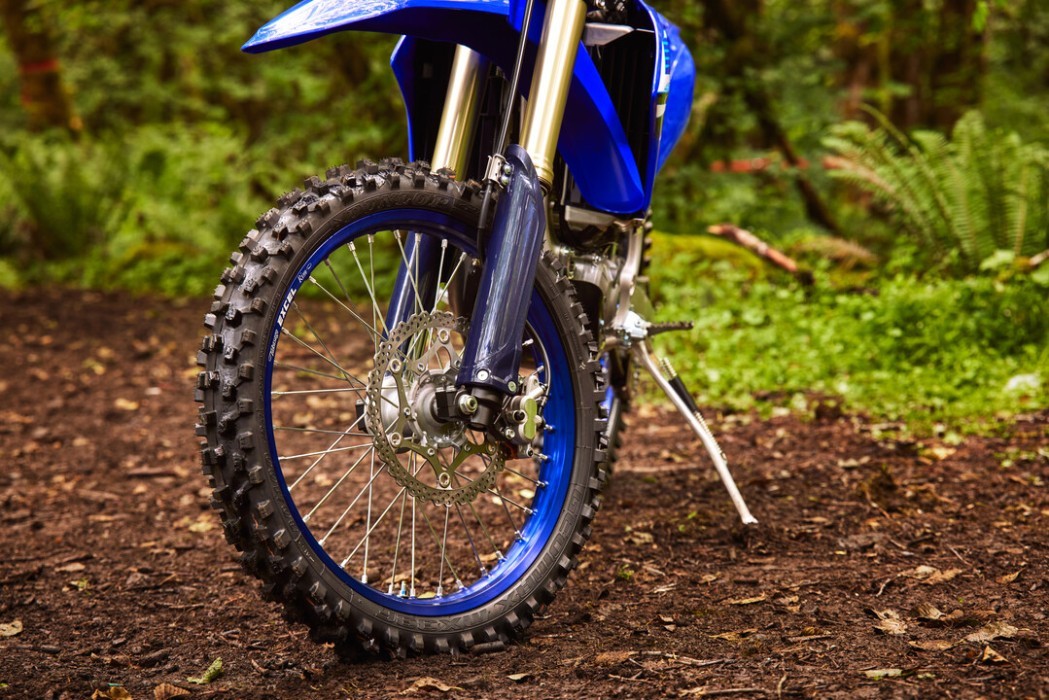 YZ450FX 2025 static image of enduro bike front wheel