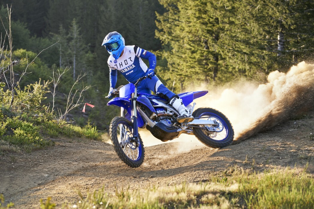 Action image of Yamaha YZ450FX in Blue colourway, big roost