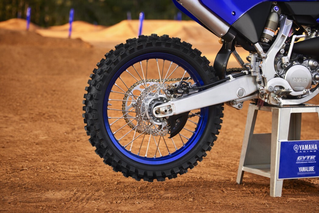 Detail image of Yamaha YZ125 two stroke in Blue colourway, rear wheel and swingarm