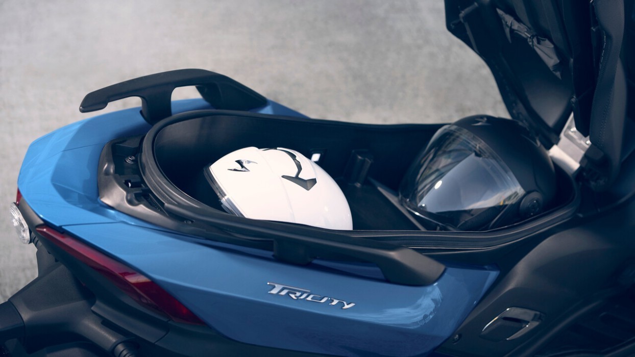 Detail image of Yamaha Tricity 300 in blue colourway, underseat storage compartment