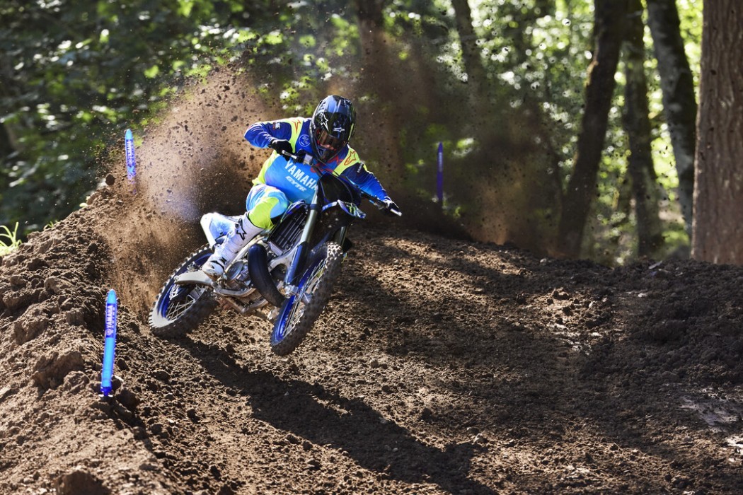 YZ250SP 2025 static image of motocross bike racing around corner