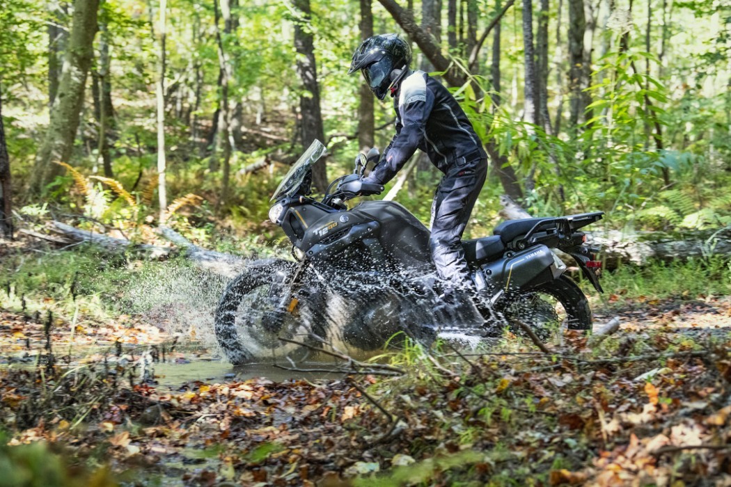 Action image of Yamaha Super Tenere in Black Colourway, small water crossing
