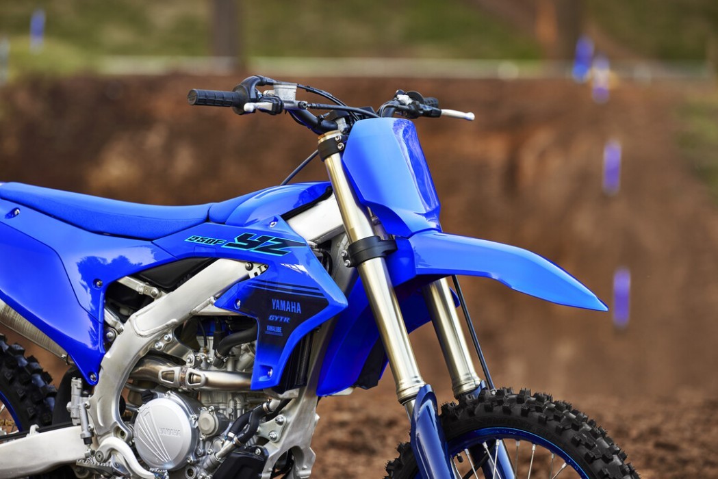 Detail image of Yamaha YZ250F 2024 Motocrosser in Blue Colourway, front three quarter mudguard and forks