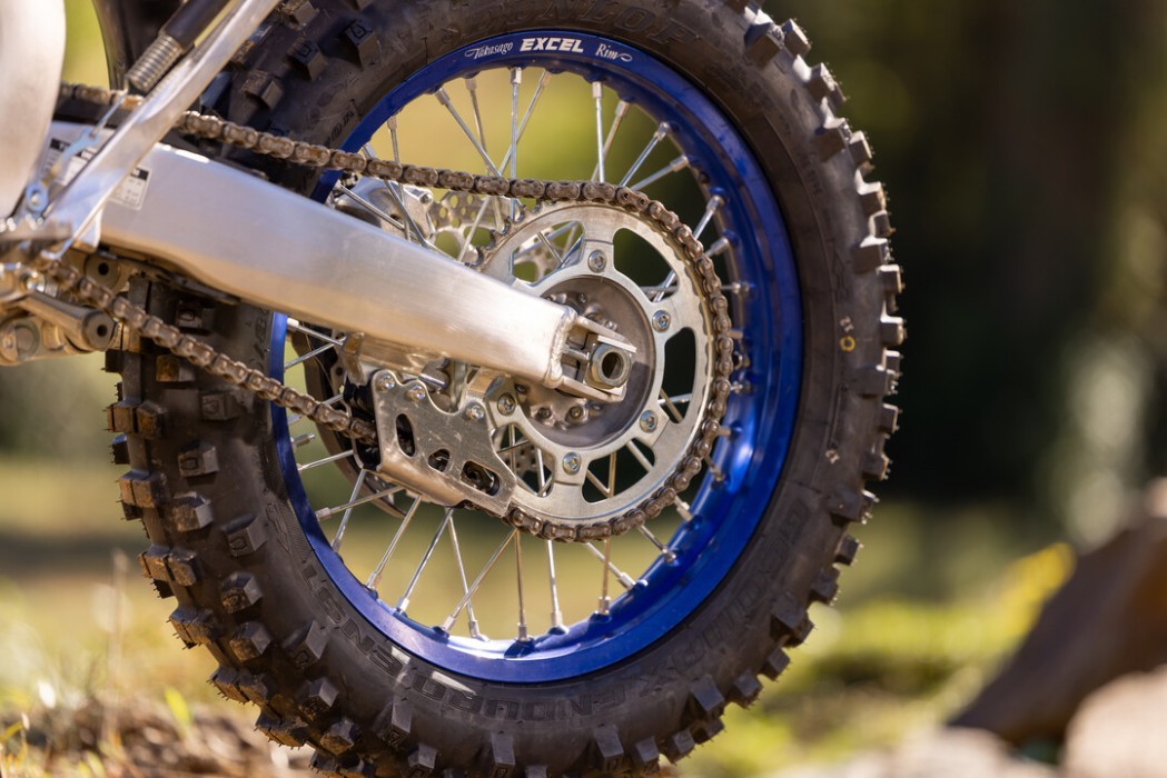 Yamaha WR450F 2025 in blue colourway, detail image of rear wheel section