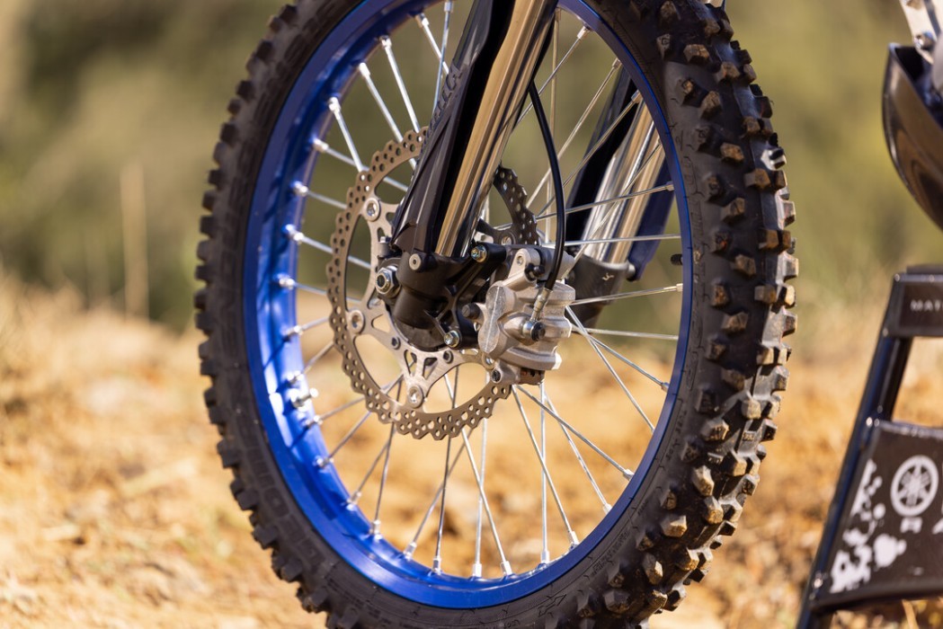 Yamaha WR450F 2025 in blue colourway, detail image of front wheel section