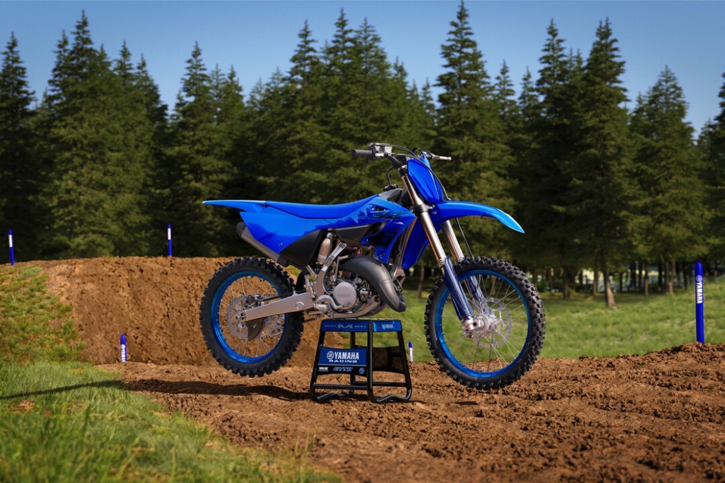 Static image of Yamaha YZ125 two stroke in Blue colourway, outdoor motocross track